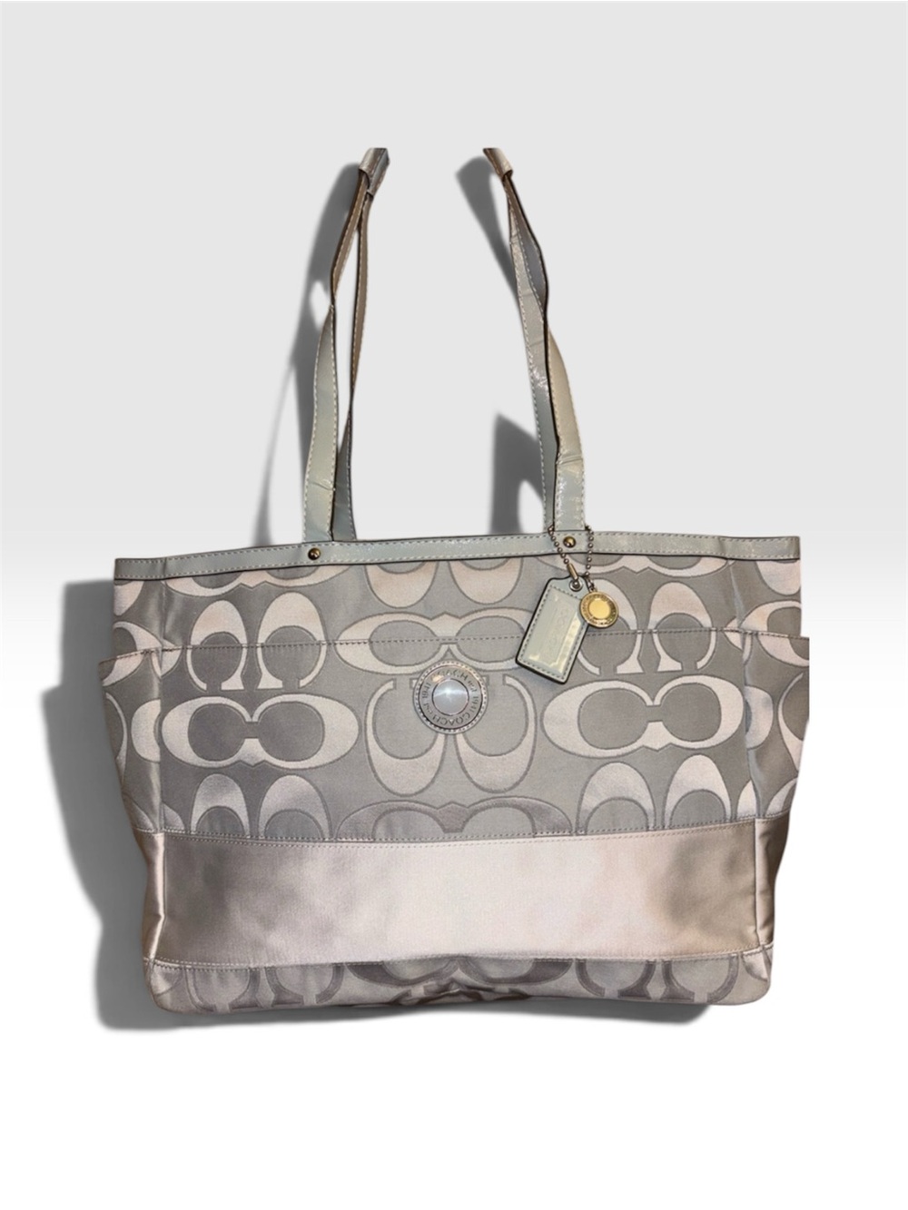 Coach F19422 Gray Signature Multifunctional Travel Tote with Metallic Accent